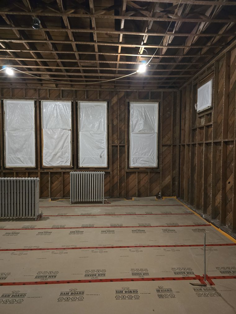 Interior strip-out with floor protection in place